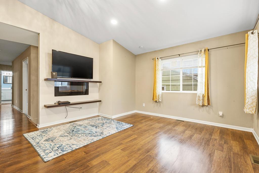 Cozy, welcoming living room upon stepping in from the front door