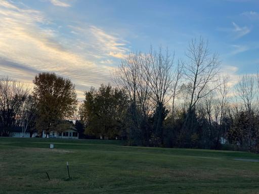 The open lot rests quietly, ready for a dream to rise.