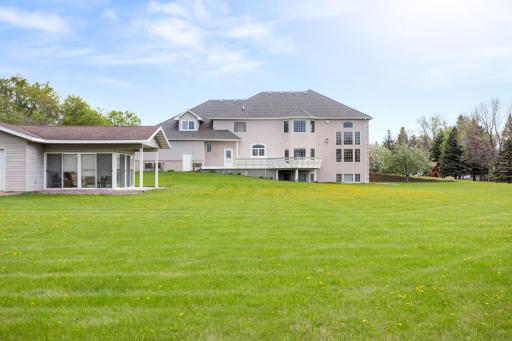 Rear view with extra garage/3 season room