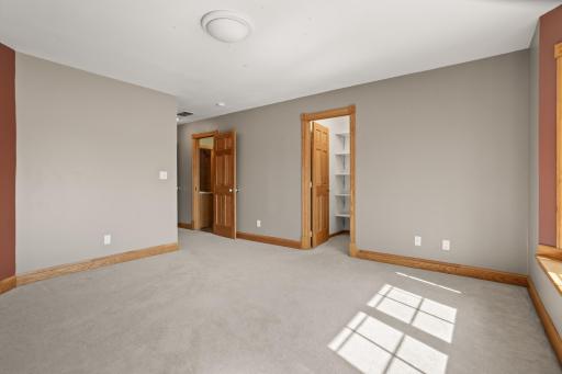 Upper guest bedroom #2 with walk-in and shared bath