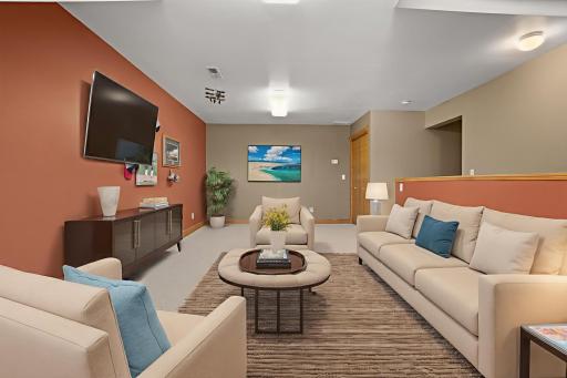 Upper level family/game room-digitally altered with staging