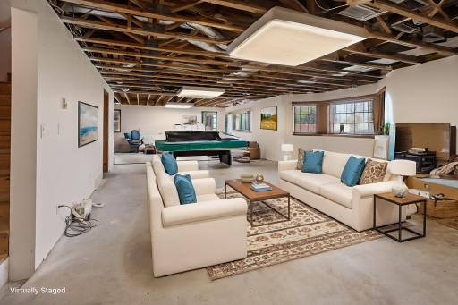 Basement family/game room-digitally altered with staging