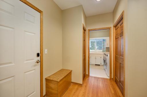 Informal Entry off Garage with Multiple Closets and storage