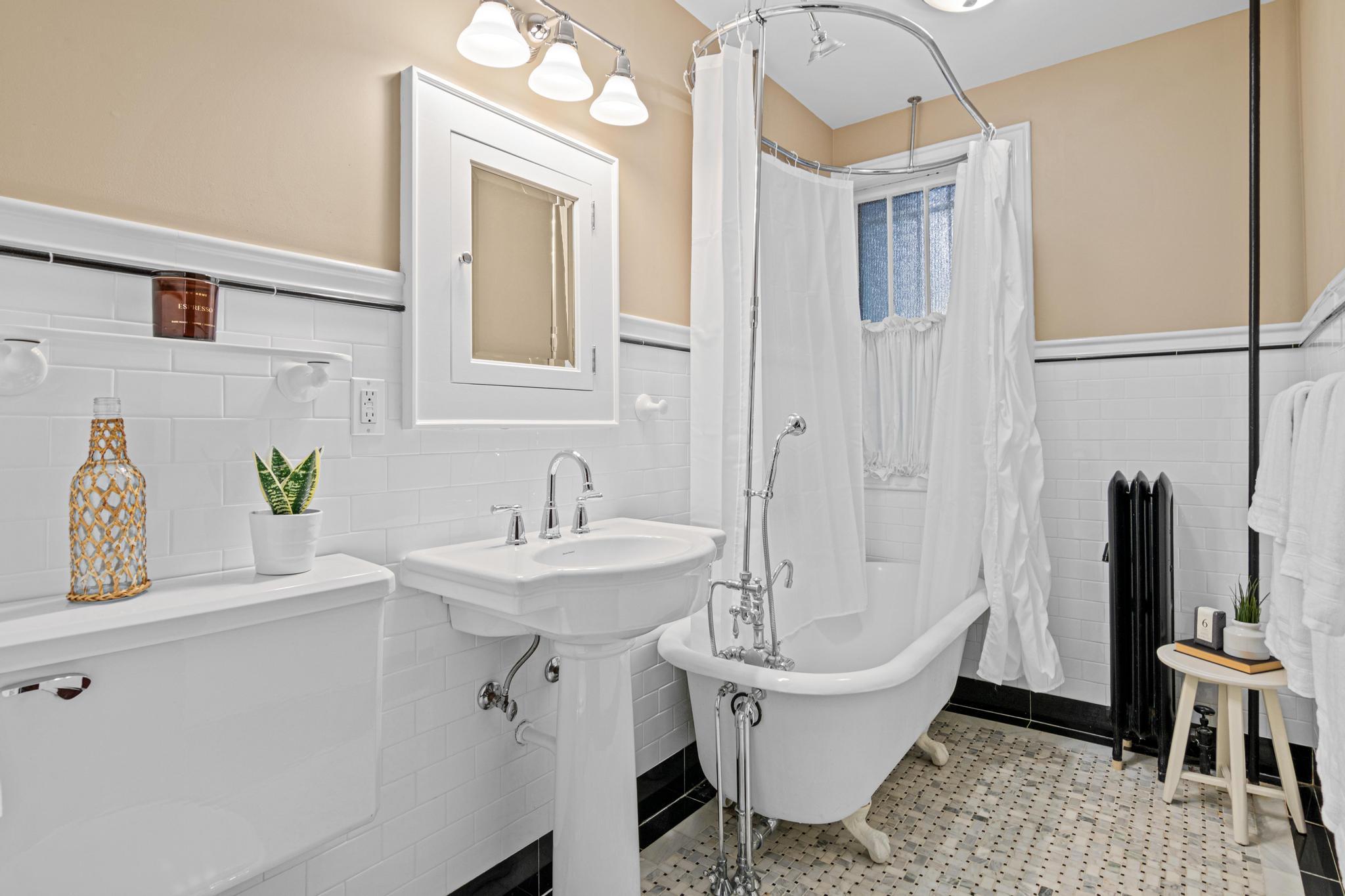 Beautifully updated and restored full bathroom.