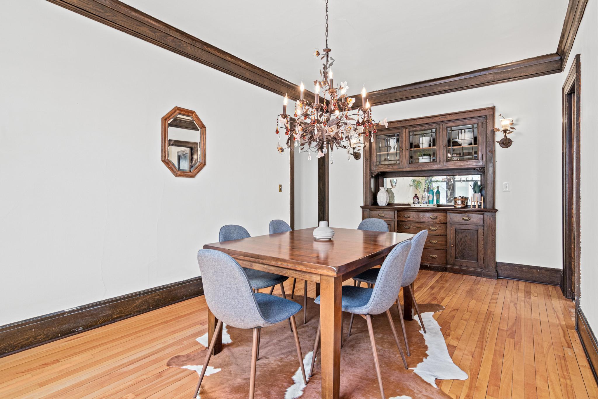 Formal Dining room W/ pantry, (& a servants button located under the dining rug!)