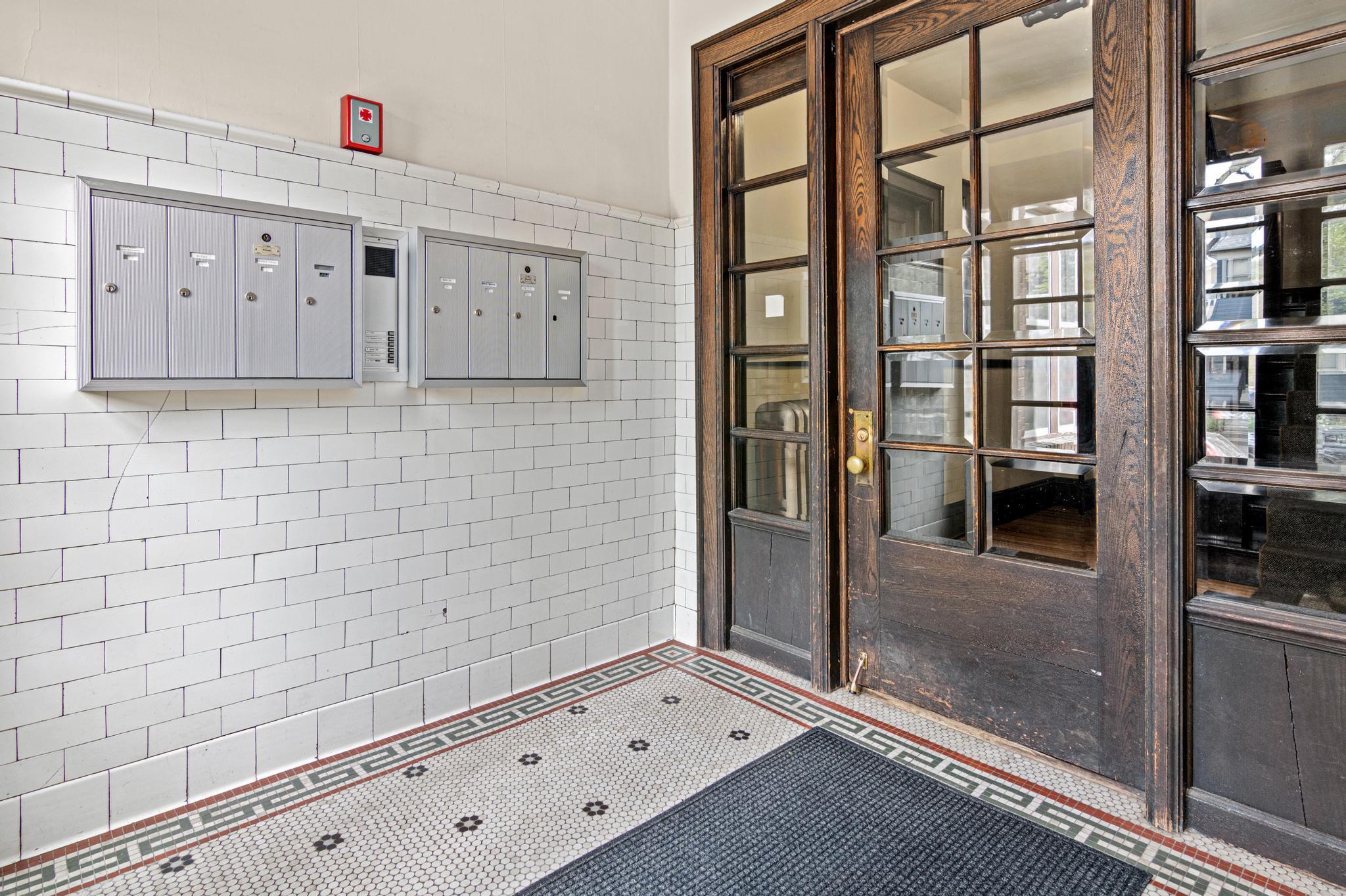 SECURED FRONT ENTRY W/ ORIGINAL TILE