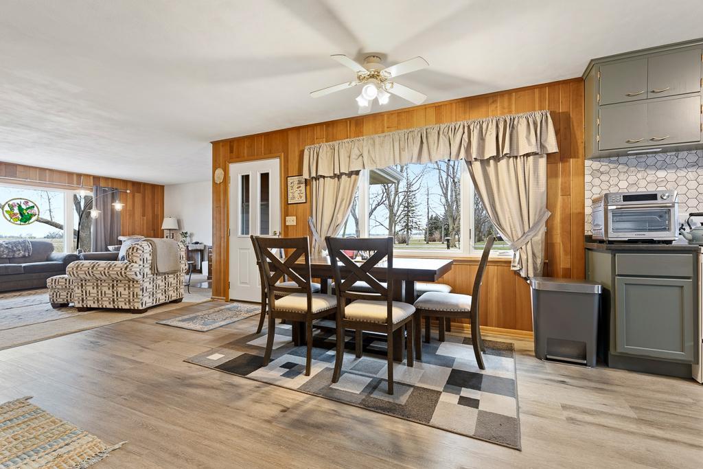 The dining space offers peaceful views to the front yard of the home