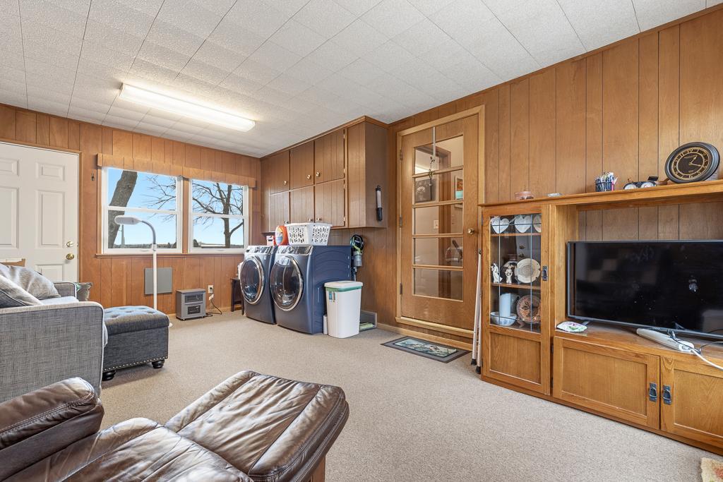 Step inside the home from the attached garage to a cozy porch - laundry hookups on main level offer convenience for this busy property!