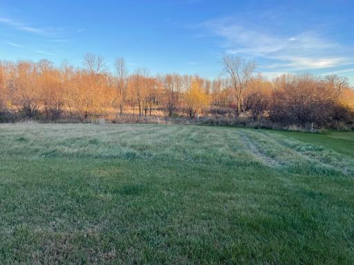 Gentle breezes sweep across the lot, untouched and serene.