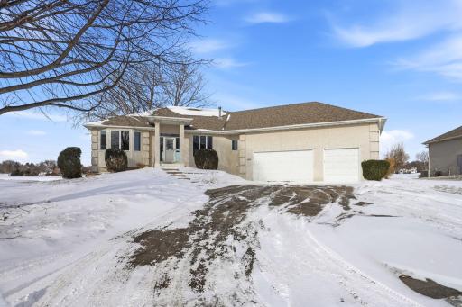 Inviting curb appeal with golf course setting and beautifully maintained exterior.