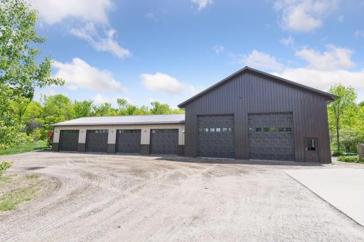 With 11 total garage stalls on the property, the pole building offers 8 stalls to park your RV, boat and fleet of toys. Complete with climate controlled workshop, epoxy floor, spray foamed and mezzanine area with a door and ledger for a future deck.