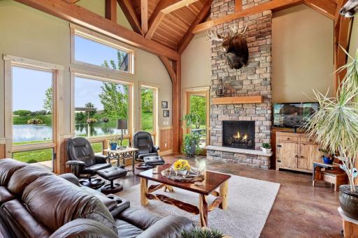 With floor to ceiling storybrook stone the gas fireplace is rustic and inviting.