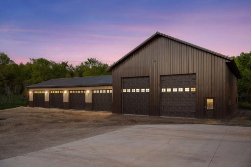 36' x 70' pole building with 5 garage stalls and workshop and 40' x 56' main garage with (2) 14' doors.