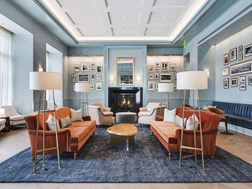 Stylish gathering room with fireplace and seating for entertaining.