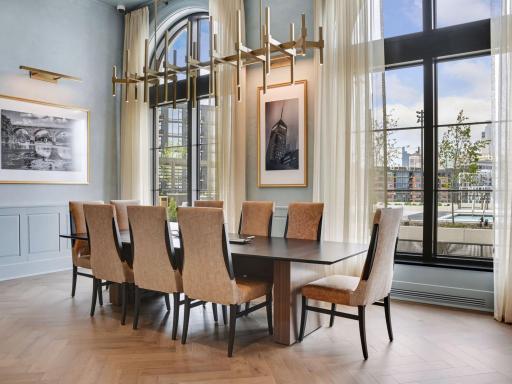 Private dining space with seating for eight and floor-to-ceiling windows.