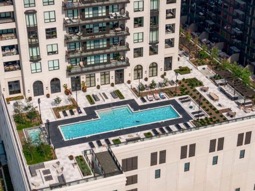 75-foot lap pool and hot tub, outdoor kitchens/dining areas, and fireplaces.