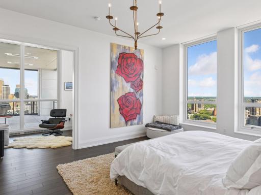 Bright and airy bedroom with direct access to a private lounge.