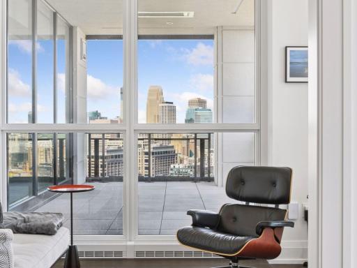 Expansive windows frame incredible downtown views from the private retreat.