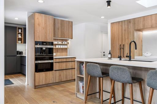 Steps away from your kitchen is the butler's pantry with floor-to-ceiling storage rivals those in million-dollar estates.