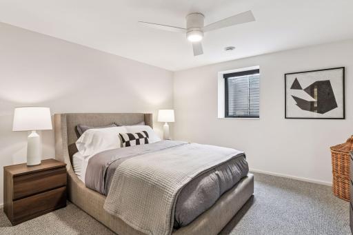 This thoughtfully designed bedroom offers the ultimate in flexibility for multi-generational living, home office, or au pair quarters with premium finishes and abundant natural light.