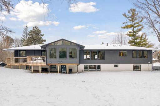 Lock-and-leave luxury in Edina's Parkwood Knolls - truly turnkey perfection.