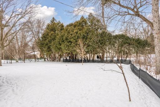 Oversized, level lot with manicured grounds provide ultimate privacy in Edina's most prestigious neighborhoods.