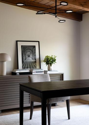 Rustic beams meet contemporary finishes in perfectly balanced harmony.