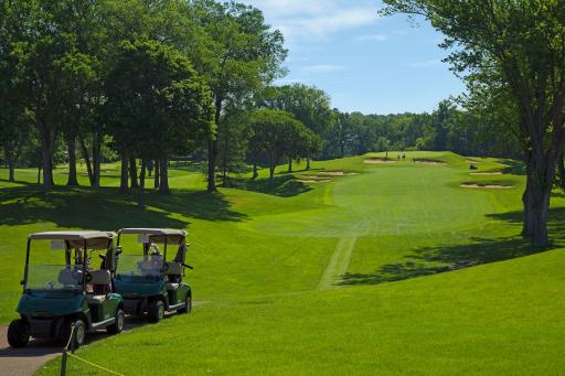 Interlachen's signature 530-yard 9th hole where Bobby Jones famously skimmed his ball across the water during his 1930 Grand Slam victory. Live moments from this storied Donald Ross masterpiece, freshly restored to championship glory.