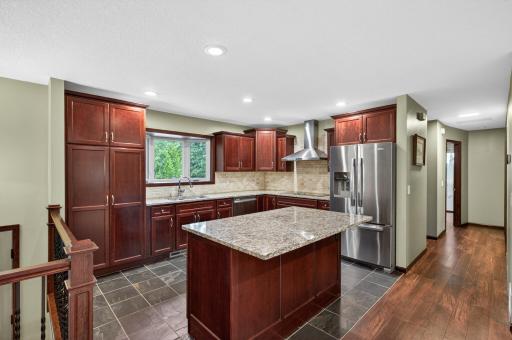 Kitchen with granite countertops and stainless steel appliances