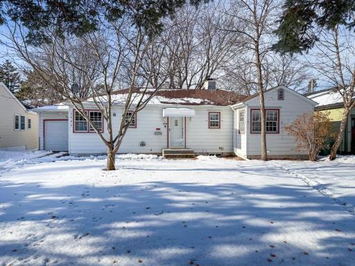 Rambler with 4 bedrooms and 2 baths with an attached garage too.