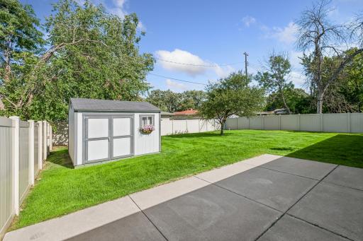 Large, fenced in backyard with good-sized shed and large patio for all your outdoor entertaining and relaxing needs!