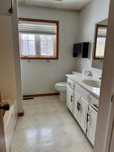Main floor walk through bath to primary bedroom