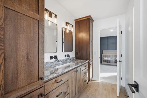 Duel mirrors, duel vanity spaces, separate shower/tub space.