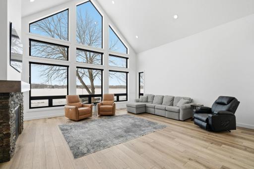 Great gathering room! Floor to ceiling windows with stunning lake views! Automated black out blinds!