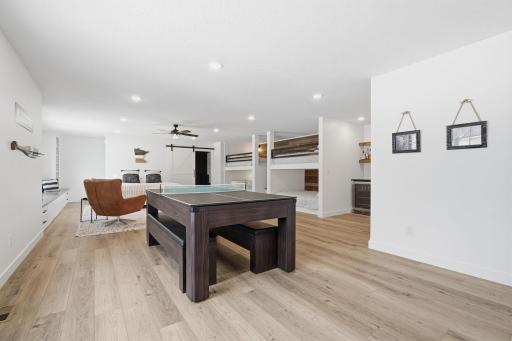 Entertainment room! Pool table, living room, wet bar, built ins and bunk beds!