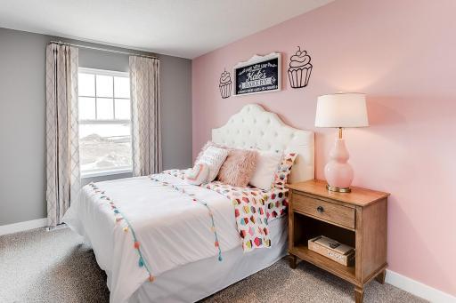 Each of the home's three secondary upper level bedrooms are abundant in space! (Photos of the same floorplan, colors are similar).