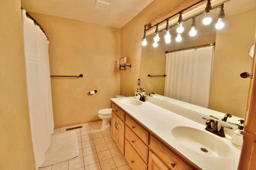 UL Bathroom w/ DBL Sinks & Decorative Tile