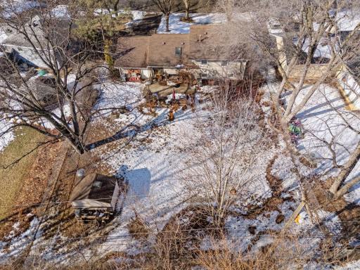Great fenced in yard with a shed