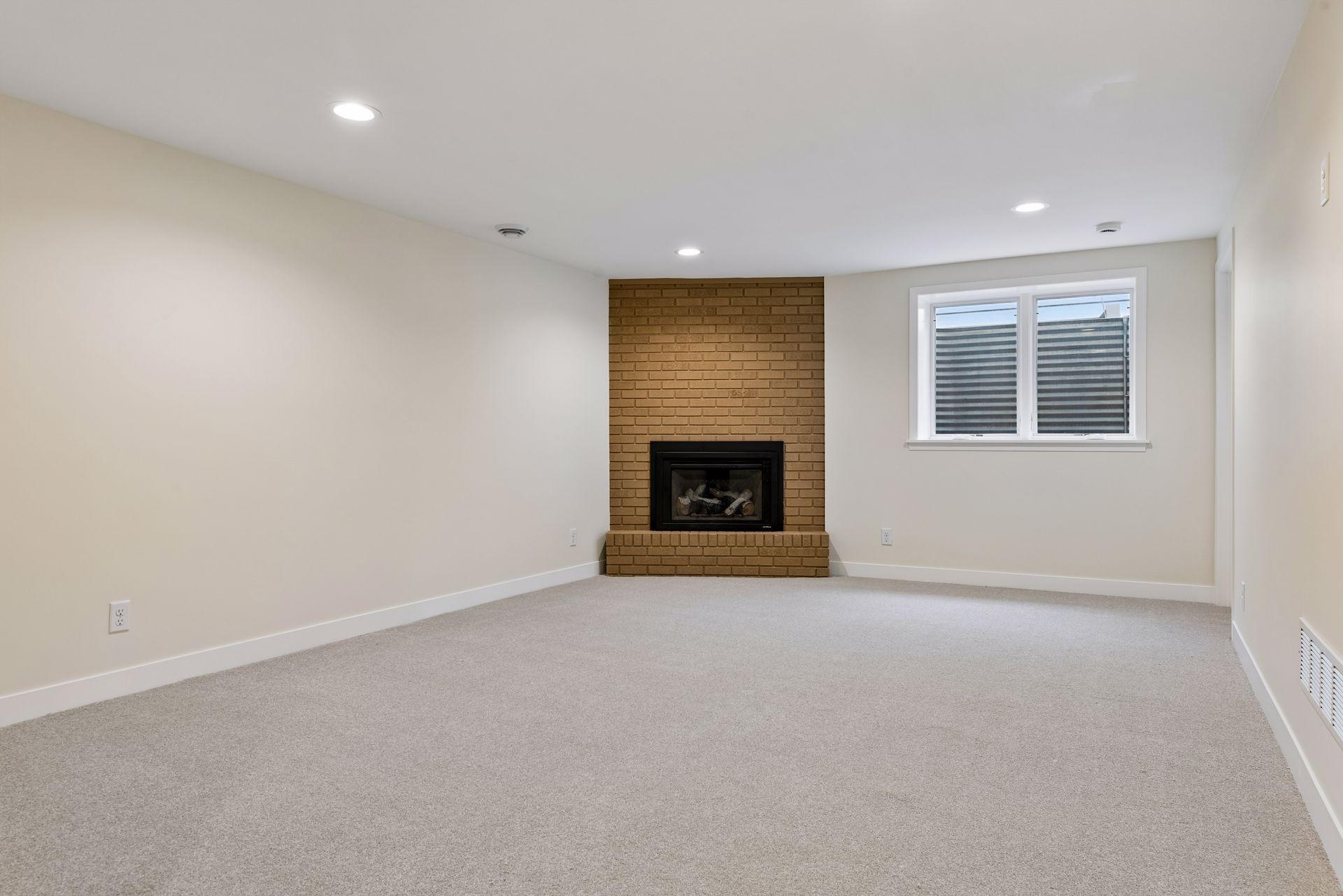 Basement includes fully renovated family room with new gas fireplace, and egress window for improved light and usability.