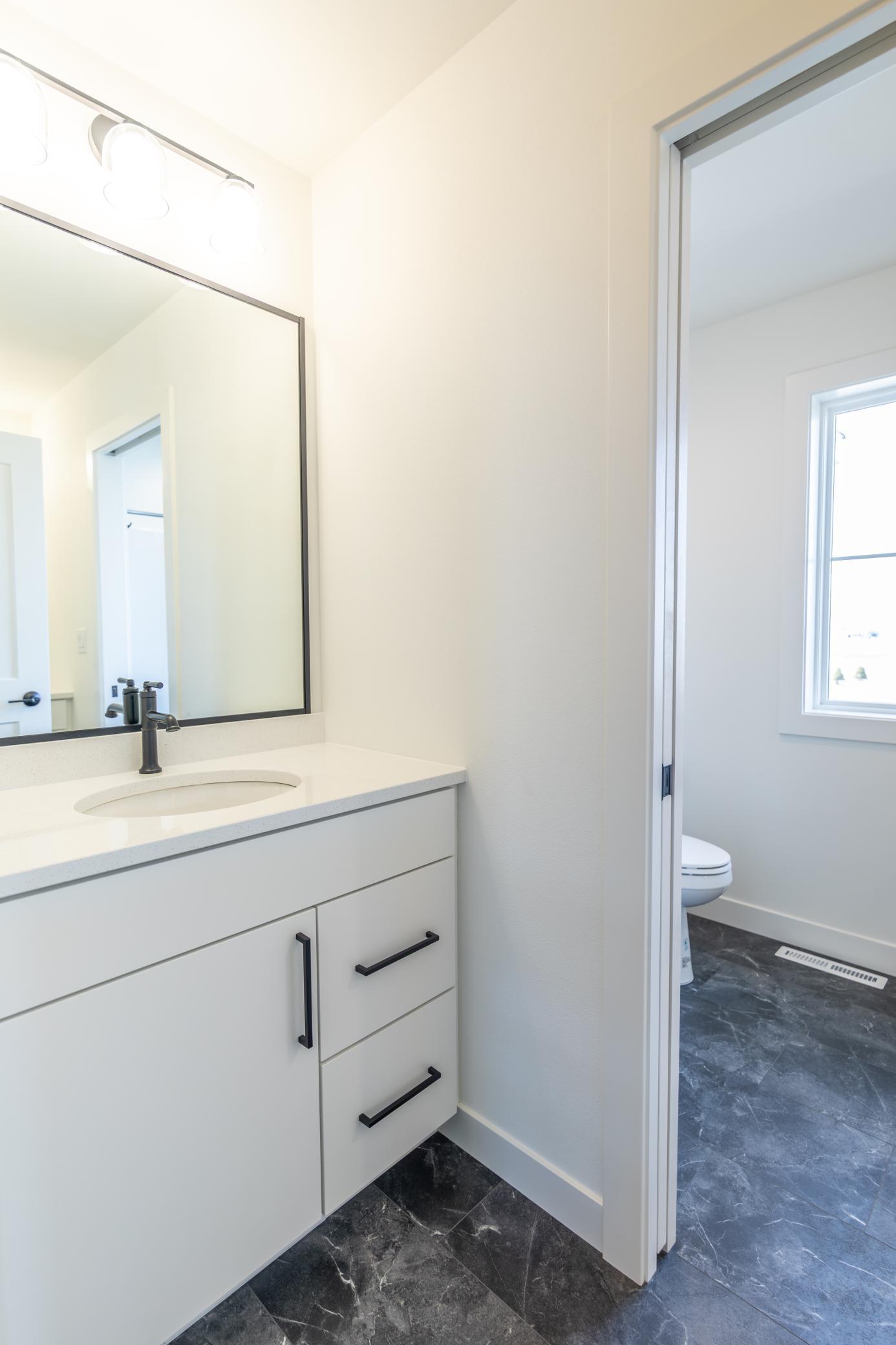 Upstairs Guest Bathroom - Dual Vanities