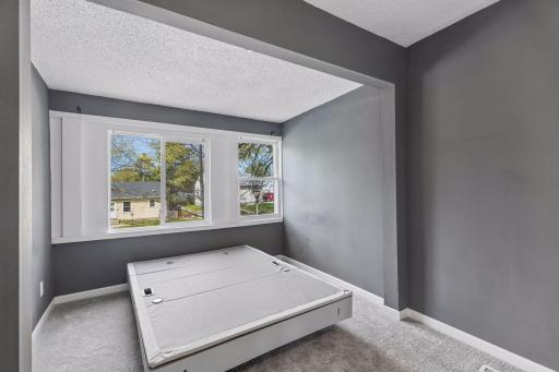 Main floor bedroom with brand new carpet.