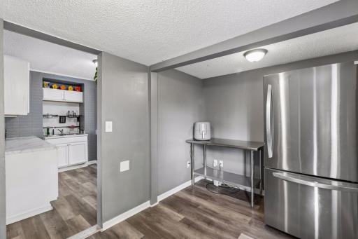Adjacent kitchen space used for prep and pantry.