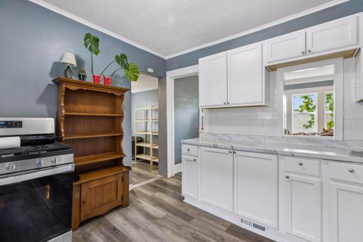 Wonderful natural light floods the dining room into the kitchen.