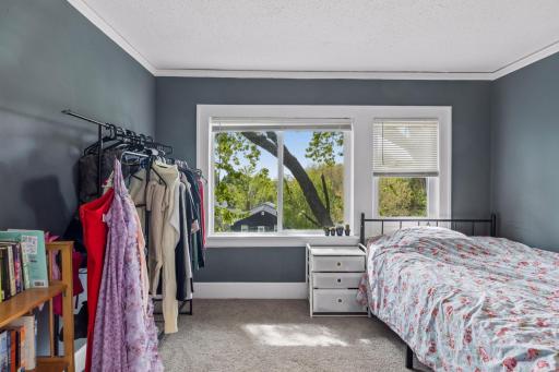 Third upper level bedroom with views of the treetops!
