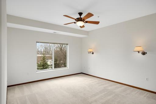 Spacious owner's suite with private bathroom, walk-in closet and laundry