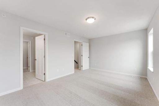 Photos of former model home, options and color selections will vary.
