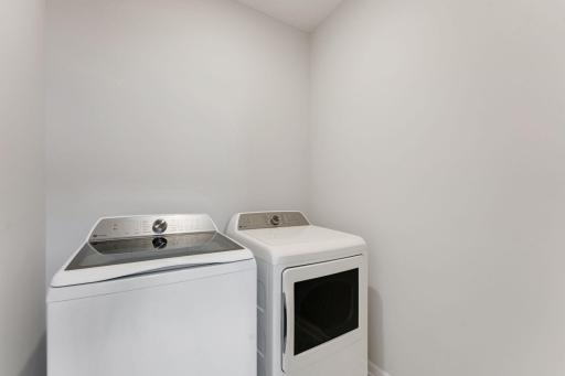 Photos of former model home, options and color selections will vary.