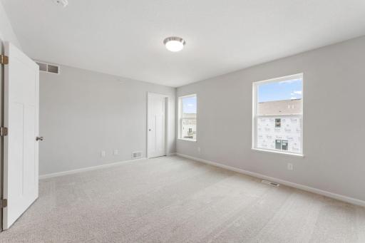 Photos of former model home, options and color selections will vary.