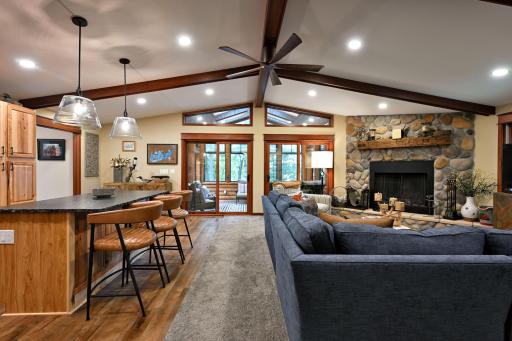 Open floor plan, kitchen, living room and 3 season room