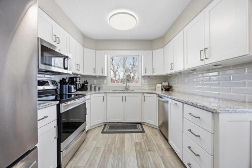 Kitchen- custom cabinets, soft close, quartz counter tops